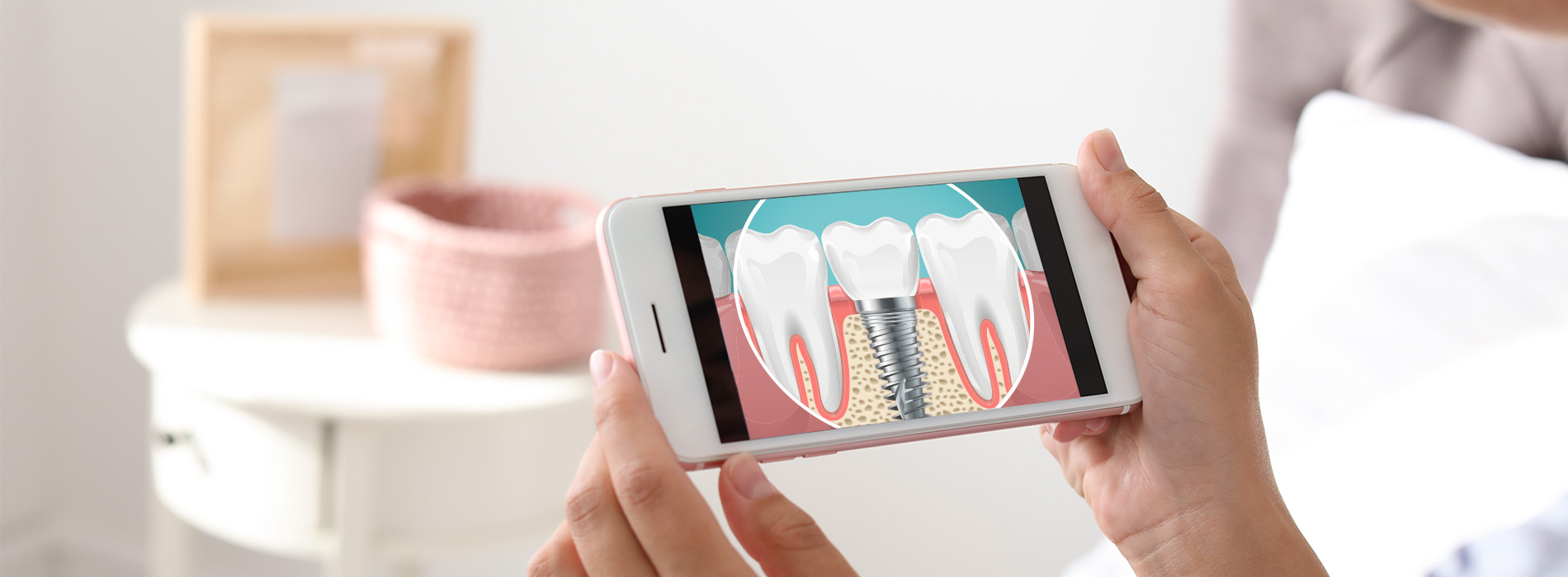 A person holding a smartphone with a screen displaying an interactive dental care app, featuring a toothbrush animation.